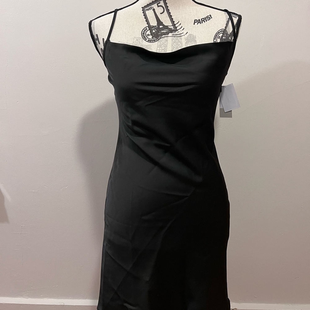 Brand new black silk, slip on dress. Size XS